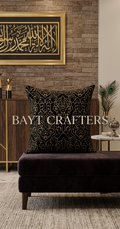 Black and gold luxury damask pattern sofa cushion by Bayt Crafters